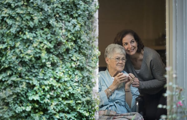 Women looking out the door